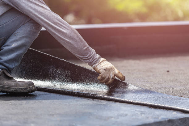 Professional Waterproofing technician working in Farwell, MI